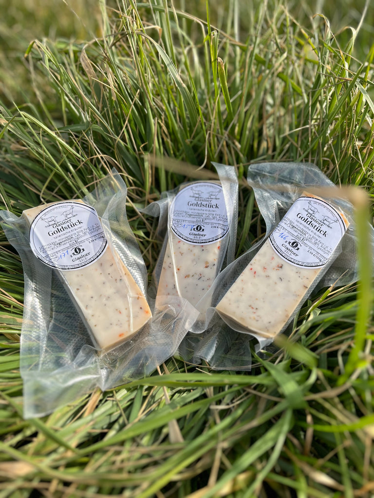 Ziegenkäse Glasiner Goldstück italienische Kräuter vakuumiert und etikettiert